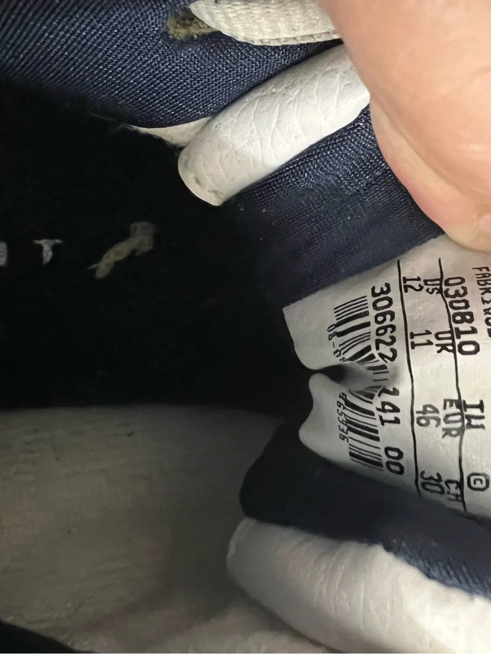 Nike Men’s White and Navy Leather Athletic Shoes